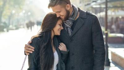 Couple hugging while ot for a walk