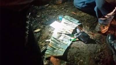 En una billetera de una de las dos víctimas se encontraron 3,900 dólares en efectivo.