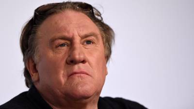 (FILES) In this file photo taken on May 22, 2015 French actor Gerard Depardieu attends a press conference for the film Valley of Love at the 68th Cannes Film Festival in Cannes, southeastern France. - Thirteen women accuse Gerard Depardieu, already under investigation for suspicions of rape and sexual assault on the actress Charlotte Arnould, of sexual violence, according to a report by Mediapart. Contacted by AFP, the Paris prosecutor's office said on April 12, 2023 that it has not yet received any new complaint, and specified that the investigation opened in July 2020 following the complaint of an actress, Charlotte Arnould, was continuing. (Photo by Anne-Christine POUJOULAT / AFP)
