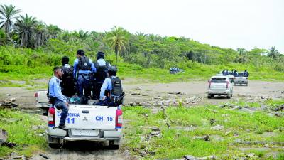 <b>La Policía sigue buscando los cuerpos de José Sosa y sus escoltas, tres de los carros en que andaban fueron hallados en el río Ulúa.</b>