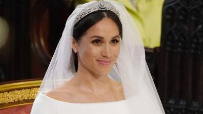 US fiancee of Britain's Prince Harry, Meghan Markle arrives at the High Altar for their wedding ceremony in St George's Chapel, Windsor Castle, in Windsor, on May 19, 2018. / AFP PHOTO / POOL / Jonathan Brady