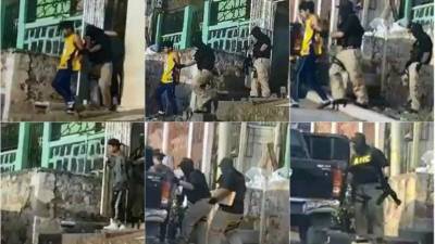 Momento en el que los jóvenes eran sacados de una casa por sicarios vestidos como agentes.