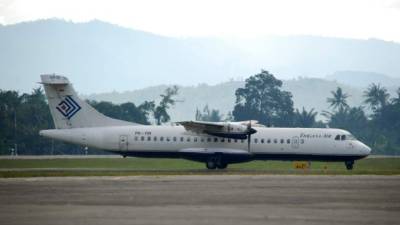 La tripulación transportaba más de 400 mil dólares en el avión siniestrado en Indonesia.
