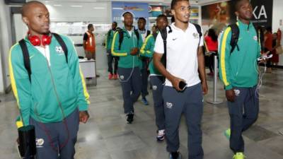 Los seleccionados de Sudáfrica a su llegada al aeropuerto de San Pedro Sula. Foto Delmer Martínez