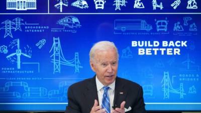 US President Joe Biden speaks during a virtual meeting with governors, mayors and local officials on the Infrastructure Investment and Jobs Act in the South Court Auditorium of the Eisenhower Executive Office Building in Washington, DC, on August 11, 2021. (Photo by MANDEL NGAN / AFP)