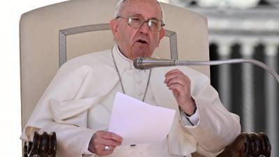 Pope Francis holds a weekly general audience on Saint Peter's square in the Vatican on April 27, 2022. (Photo by Tiziana FABI / AFP)