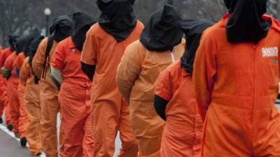 Activistas estadounidenses exigieron al presidente Obama el cierre de Guantánamo.
