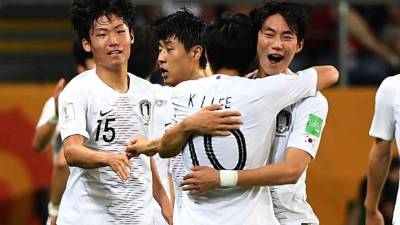 Los jugadores de Corea del Sur celebrando su gol ante Ecuador. Foto AFP
