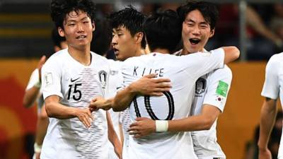 Los jugadores de Corea del Sur celebrando su gol ante Ecuador. Foto AFP