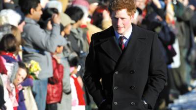 Britain's Prince Harry arrives for the British royal family's traditional Christmas Day church service in Sandringham, England, Saturday, Dec. 25, 2010. (AP Photo/Matt Dunham)