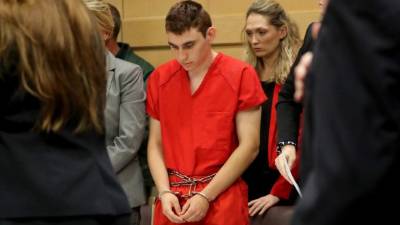 En la imagen, el autor confeso del tiroteo en un instituto de Florida el pasado 14 de febrero, Nikolas Cruz (centro). EFE/Archivo