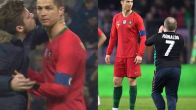 Durante la goleada de 3-0 que encajó Portugal ante Holanda, el crack luso Cristiano Ronaldo no pudo destacar pero algunos aficionados saltaron al campo para llevarse un recuerdo del atacante luso.