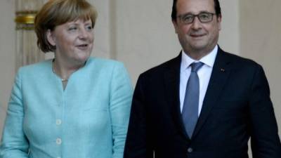 La canciller alemana, Angela Merkel, y el presidente francés, François Hollande unifican posturas. Foto: AFP