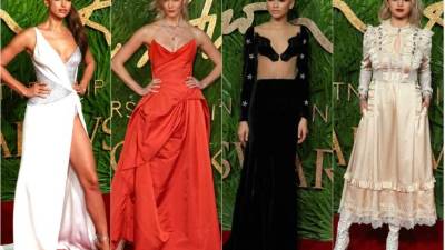 La modelo rusa de 31 años de edad llamó la atención de los presentes Con este vestido blanco con escote corazón, cuerpo plateado y abertura lateral de Atelier Versace..