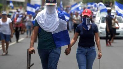 Manifestantes opositores siguen desafiando al régimen de Ortega en las calles./AFP.