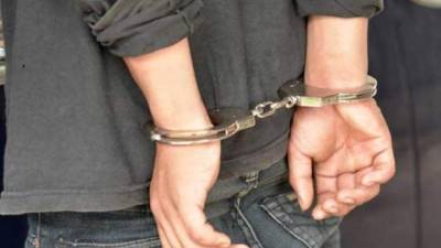 Foto referencial de una persona detenida.