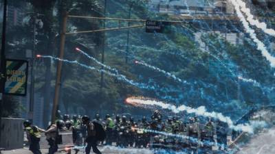 La policía venezola reprimió violentamente a los manifestantes opositores en Caracas. AFP.