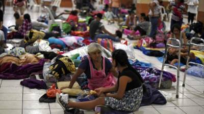 Miles de damnificados se encuentran refugiados en albergues en Guatemala./AFP.