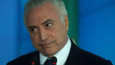 El presidente de Brasil, Michel Temer, participa hoy, lunes 26 de junio de 2017, en una Ceremonia de Sanción de la Ley que regula la Diferenciación de Precio, en el Palacio de Planalto, en la ciudad de Brasilia (Brasil). EFE