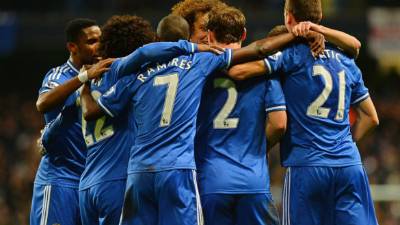 Chelsea's French midfielder Tiemoue Bakayoko (L) celebrates scoring his team's fourth goal with Chelsea's Belgian midfielder Eden Hazard during the UEFA Champions League Group C football match between Chelsea and Qarabag at Stamford Bridge in London on September 12, 2017. / AFP PHOTO / Ben STANSALL
