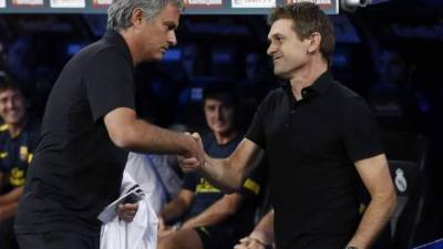 Tito Vilanova y Mourinho durante un clásico de la Liga de España.