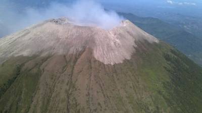 PAHOA, HI - MAY 20: A steam plume rises as lava enters the Pacific Ocean, after flowing to the water from a Kilauea volcano fissure, on Hawaii's Big Island on May 20, 2018 near Pahoa, Hawaii. Officials are concerned that 'laze', a dangerous product produced when hot lava hits cool ocean water, will affect residents. Laze, a word combination of lava and haze, contains hydrochloric acid steam along with volcanic glass particles. Mario Tama/Getty Images/AFP== FOR NEWSPAPERS, INTERNET, TELCOS & TELEVISION USE ONLY ==