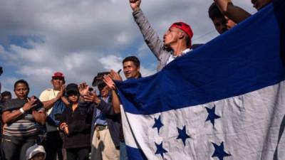Migrantes hondureños en Tijuana buscan solicitar asilo en Estados Unidos./AFP.