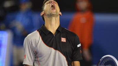 El serbio Novak Djokovic no pudo contra Stanislas Wawrinka y se queda en cuartos de final.