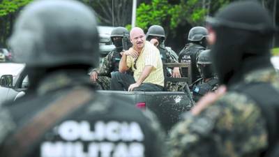 El cajero de la Unah, Francisco Obando Torres, al momento de su captura por elementos de la Policía Militar.