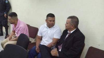 Los imputados durante el inicio de la audiencia oral y pública.