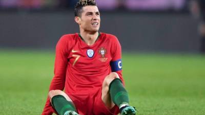 Portugal's forward Cristiano Ronaldo reacts during the international friendly football match between Portugal and Netherlands at Stade de Geneve stadium in Geneva on March 26, 2018. / AFP PHOTO / Fabrice COFFRINI