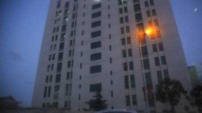 The building housing Unit 61398 of the Peoples Liberation Army is seen in the outskirts of Shanghai, Tuesday Feb. 19, 2013. Cyberattacks that stole information from 141 targets in the U.S. and other countries have been traced to the Chinese military unit in the building, a U.S. security firm alleged Tuesday. According to the report by the Virginia-based Mandiant Corp., it has traced the massive amount of hacking back to the 12-story office building run by Unit 61398, and that the attacks targeted key industries including military contractors and companies that control energy grids. China dismissed the report as 'groundless.'(AP Photo)