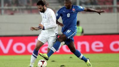 Metropolitan Hierotheos of Nafpaktos and Agios Vlasios receives a dose of the Pfizer-BioNTech Covid-19 vaccine at the Evangelismos hospital, in Athens, on December 27, 2020. (Photo by ALKIS KONSTANTINIDIS / POOL / AFP)