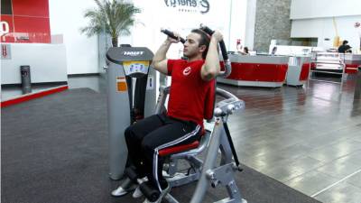 Young couple doing push-ups