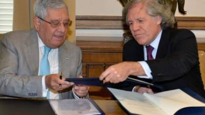 El acuerdo fue suscrito ayer entre el embajador de Honduras en la OEA Leonidas Rosa Bautista y Luis Almagro.
