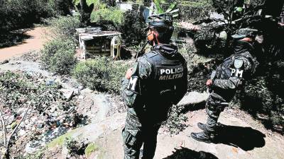 <b><span class=mln_uppercase_mln>Escena.</span></b> La Policía Militar llegó a las riberas del río Choluteca.