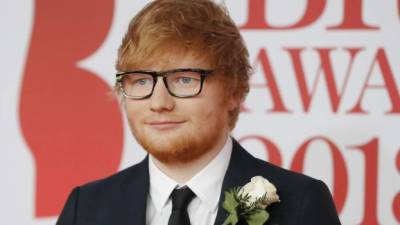 Ed Sheeran se comprometió con su novia, Cherry Seaborn, el 31 de diciembre pasado./ AFP PHOTO / Tolga AKMEN