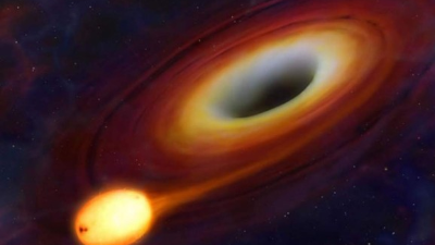 (FILES) In this file photo taken on April 10, 2019, (L-R) Event Horizon Telescope Director Sheperd Doeleman, National Science Foundation Director France Cordova, University of Arizona Associate Professor of Astronomy Dan Marrone, University of Waterloo Associate Professor Avery Broderick and University of Amsterdam Professor of Theoretical High Energy Astrophysics Sera Markoff reveal the first photograph of a black hole during a news conference organized at the National Press Club in Washington, DC. - The 347 scientists who collaborated to produce the world's first image of a black hole were honored on September 5, 2019, with the Breakthrough Prize in Fundamental Physics, winning $3 million dollars for what is known as the 'Oscars of science.' The Event Horizon Telescope Collaboration grabbed global headlines on April 10 when they published the first image of a supermassive black hole circled by a flame-orange halo of white hot plasma. (Photo by CHIP SOMODEVILLA / GETTY IMAGES NORTH AMERICA / AFP)