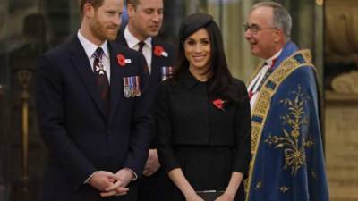 El príncipe Harry de Inglaterra y su prometida Meghan Markle.