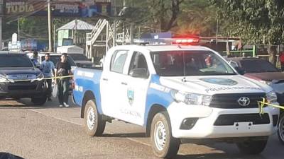 Escena donde quedó tirado el cuerpo de un presunto asaltante en San Pedro Sula.