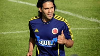 Japan's goalkeeper Eiji Kawashima (back) reacts as Colombia's forward Falcao (C) challenges Japan's defender Hiroki Sakai and Japan's defender Maya Yoshida (R) during the Russia 2018 World Cup Group H football match between Colombia and Japan at the Mordovia Arena in Saransk on June 19, 2018. / AFP PHOTO / Jack GUEZ / RESTRICTED TO EDITORIAL USE - NO MOBILE PUSH ALERTS/DOWNLOADS