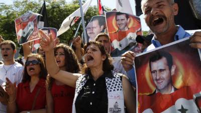 Seguidores del presidente Asad en Líbano salieron a las calles para mostrarle su respaldo.