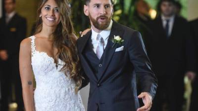 Messi y su amada chica se han casado en Rosario, Argentina. FOTO AFP / EITAN ABRAMOVICH