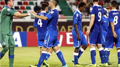 Los italianos celebrando al final del partido.