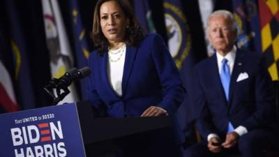 Democratic vice presidential running mate, US Senator Kamala Harris, speaks as Democratic presidential nominee and former US Vice President Joe Biden during the first press conference with Joe Biden in Wilmington, Delaware, on August 12, 2020. (Photo by Olivier DOULIERY / AFP)