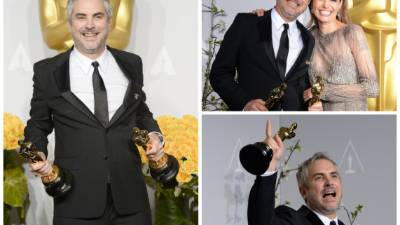 This handout photo released by A.M.P.A.S. shows Best Foreign Language Film winner for 'Roma' Mexican director Alfonso Cuaron (R) walking with US actress Angela Bassett (C) and Spanish actor Javier Bardem backstage during the 91st Annual Academy Awards at the Dolby Theatre in Hollywood, California on February 24, 2019. (Photo by Matt Sayles / A.M.P.A.S / AFP) / RESTRICTED TO EDITORIAL USE - MANDATORY CREDIT 'AFP PHOTO / A.M.P.A.S / MATT SAYLES ' - NO MARKETING - NO ADVERTISING CAMPAIGNS - DISTRIBUTED AS A SERVICE TO CLIENTS
