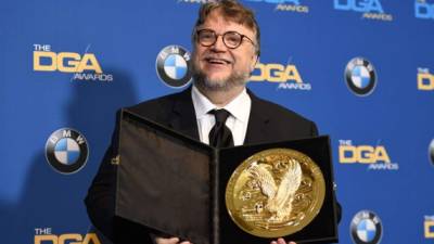Director Guillermo Del Toro, winner of the outstanding directorial achievement in feature films, poses in the press room at the 2018 DGA Awards at the Beverly Hilton in Beverly Hills, California on February 3, 2018. / AFP PHOTO / ROBYN BECK