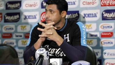 The public transportation 'Christmas bus' rides in the streets of Quito on December 21, 2018. - Since 2005, Translatinos, an Ecuadorean transport cooperative, picks a bus on a day near Christmas to give out candy instead of charging for the ride. (Photo by Cristina VEGA / AFP)