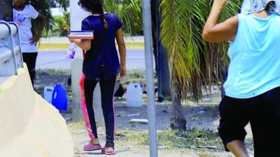 <b>Muchos niños son obligados por sus propios padres a trabajar en las calles.</b>