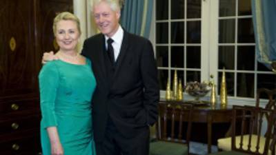 Former President Bill Clinton and Secretary of State Hillary Rodham Clinton pose for a photo after the State Department Dinner for the Kennedy Center Honors gala Saturday, Dec. 1, 2012 at the State Department in Washington. (AP Photo/Kevin Wolf)